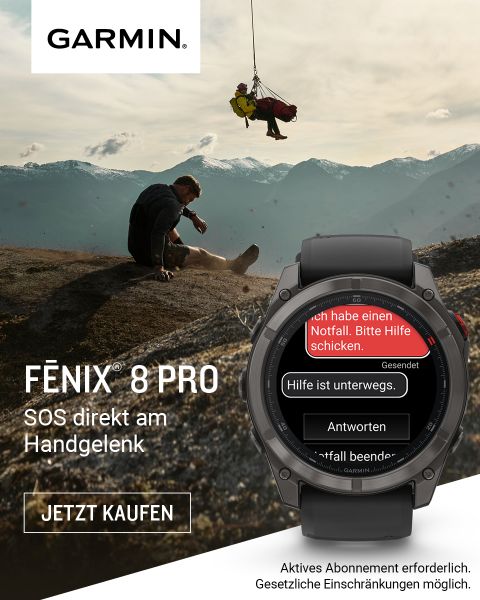 Eine Person auf einem Berg benutzt eine Garmin Fenix 8 Pro Uhr, um eine SOS-Nachricht zu senden. Der Bildschirm der Uhr zeigt die Notfalloptionen an. Im Hintergrund wird ein Rettungshelfer an einem Seil herabgelassen. Der Text bewirbt die Smartwatch.