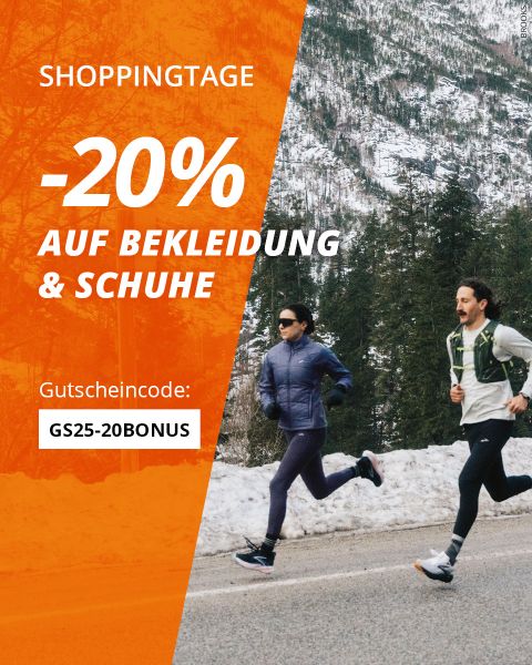 Zwei Personen joggen am verschneiten Straßenrand mit Bäumen und Bergen im Hintergrund. Auf einem orangefarbenen Banner steht: "Shoppingtage -20% auf Bekleidung & Schuhe. Gutscheincode: GS25-15BONUS.